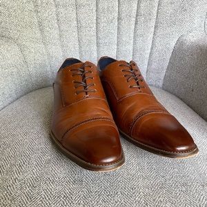 Brown leather David Stone dress shoes.